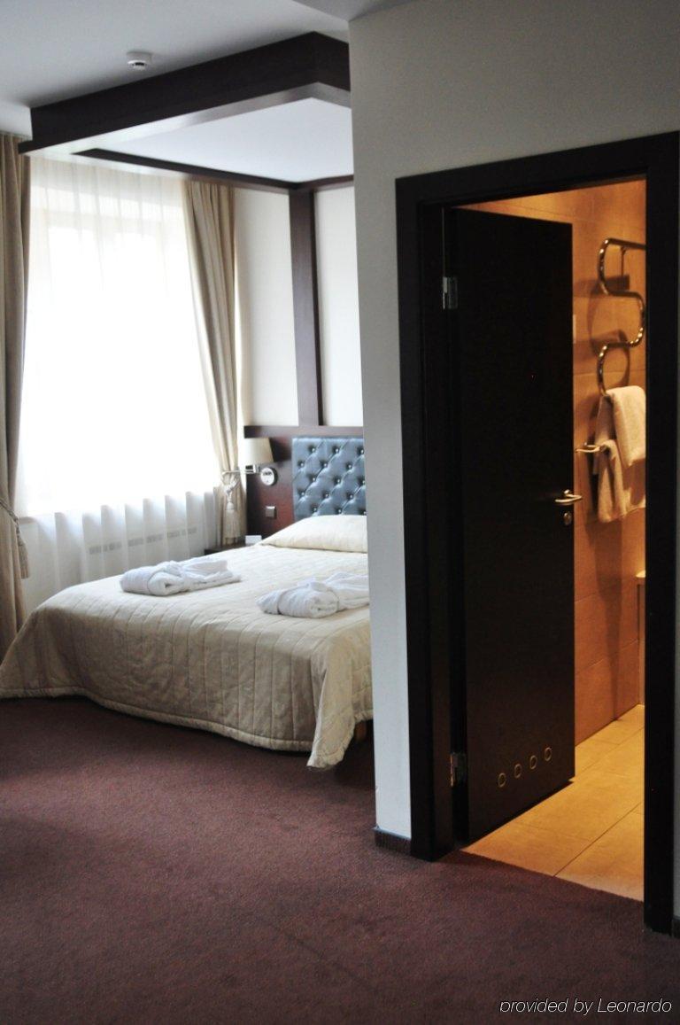 Amberton Cozy Hotel Kaunas Quarto foto